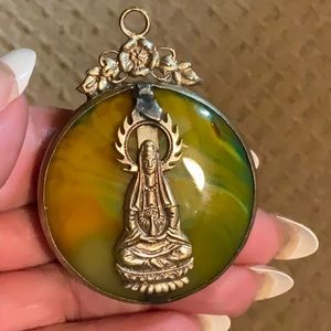 Tibetan handmade jade and silver pendant.